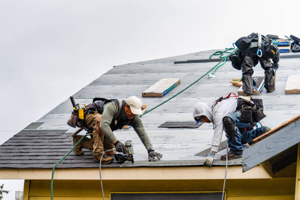 Professional Emergency Roof Repair technician working in Sweetser, IN